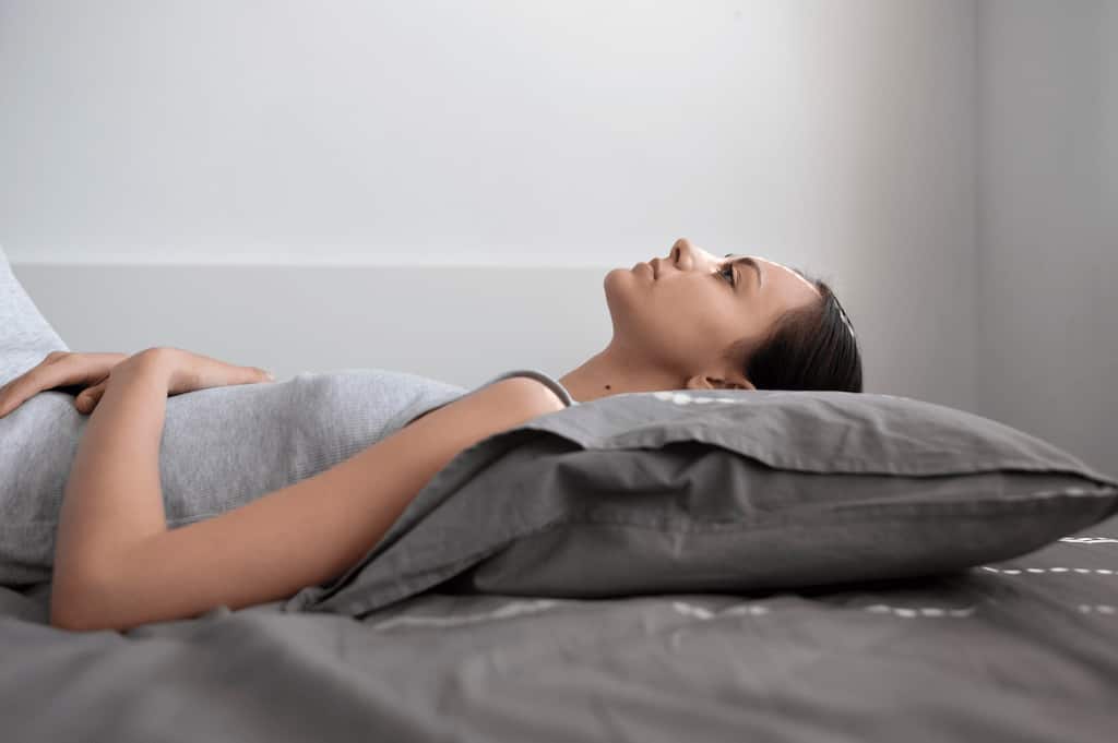 mojer postura para dormir